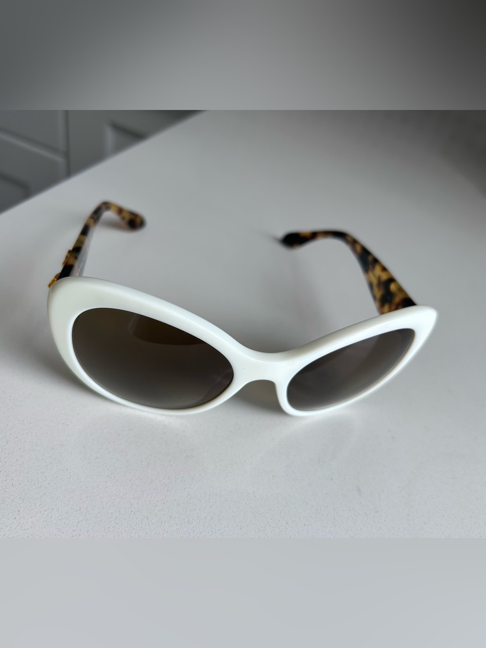 Prada White Cat-Eye Sunglasses with Tortoiseshell Arms